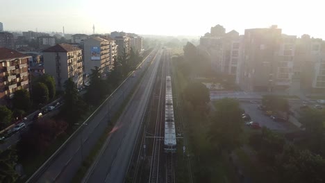 milano subway transportation in living district, aerial drone view on sunny evening