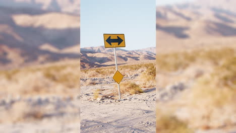 yellow road sign in the desert