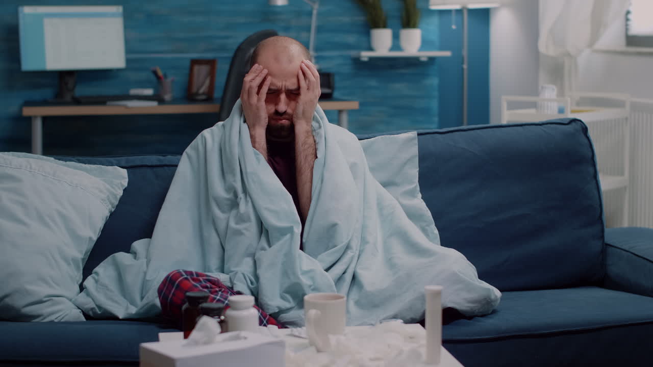 Close up of architect using digital tablet and building model to work on construction design