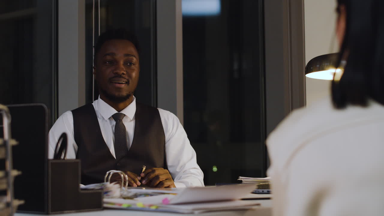 Young lawyer talking with clients