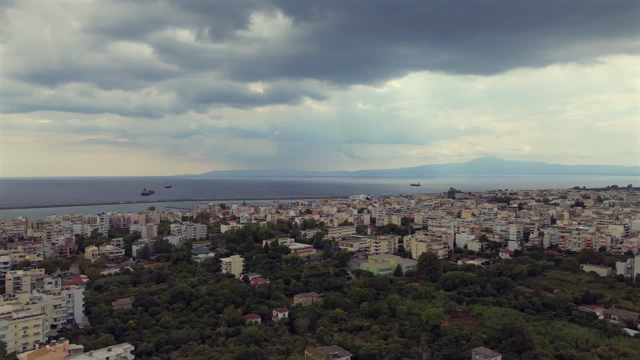 Aerial panoramic view of Kalamata cityscape on an autumn day. Pan drone movement 4k