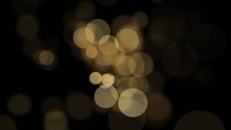 hermoso parpadeo y giro lento borroso bokeh. animación de bucle sin costuras 4k 3d para feliz navidad, feliz año nuevo, concepto de fondo festivo. oro brillante girando lentamente y brillando luz bokeh.