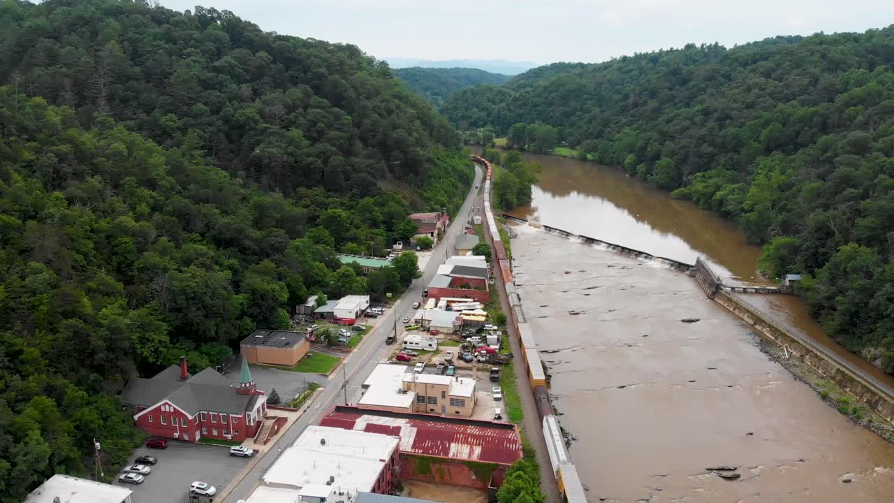4K Aerial Drone Video of a Freight Train passing through Downtown Marshall, NC along the French Broad River (2021)