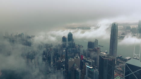 Low-Clouds-Between-Buildings,-Bank-of-China,-The-Center,-International-Finance-Center,-Hong-Kong