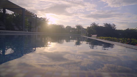 luxurious view on swimming pool at sunset in nature environment, boca, chica, panama