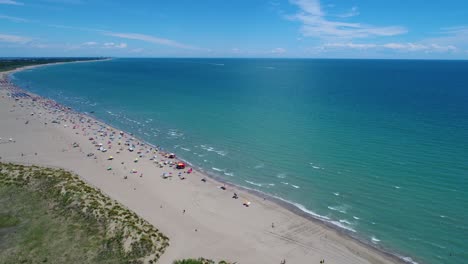 italy, the beach of the adriatic sea. rest on the sea near venice. aerial fpv drone flights.