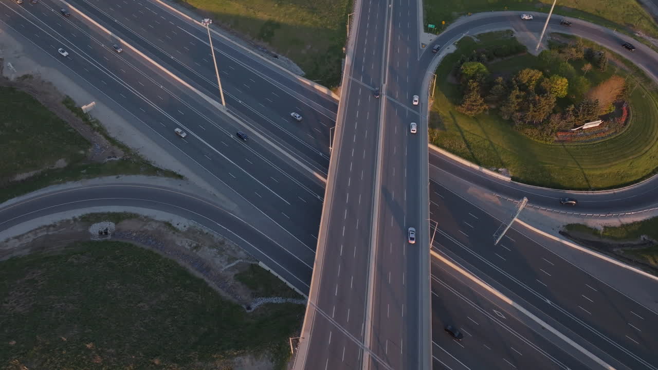 Wide aerial view of the Mississauga Highway 401 with cars moving at slow speed