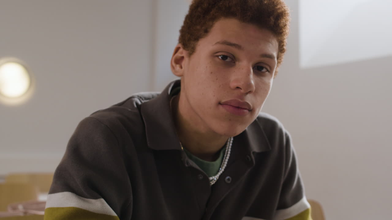 Young person writing in a notebook