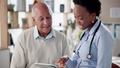 doctor consulting with elderly patient