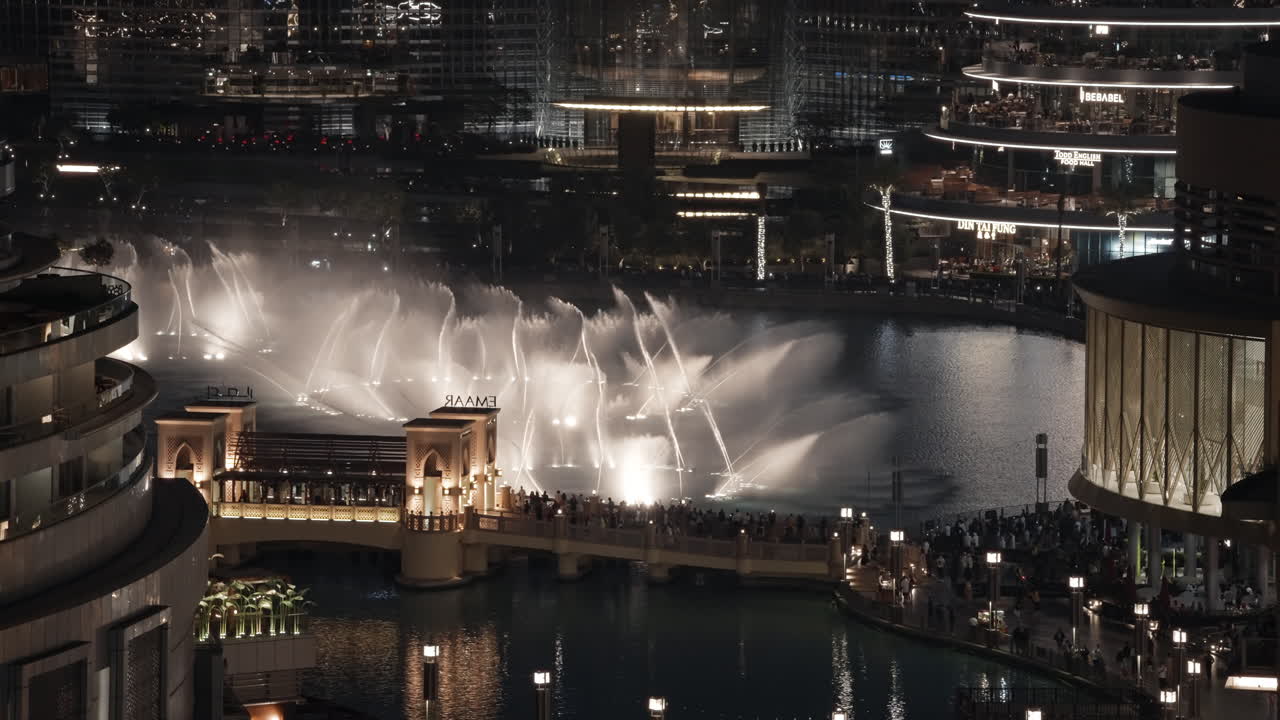 Dubai Fountain Show at Night with Cityscape View
