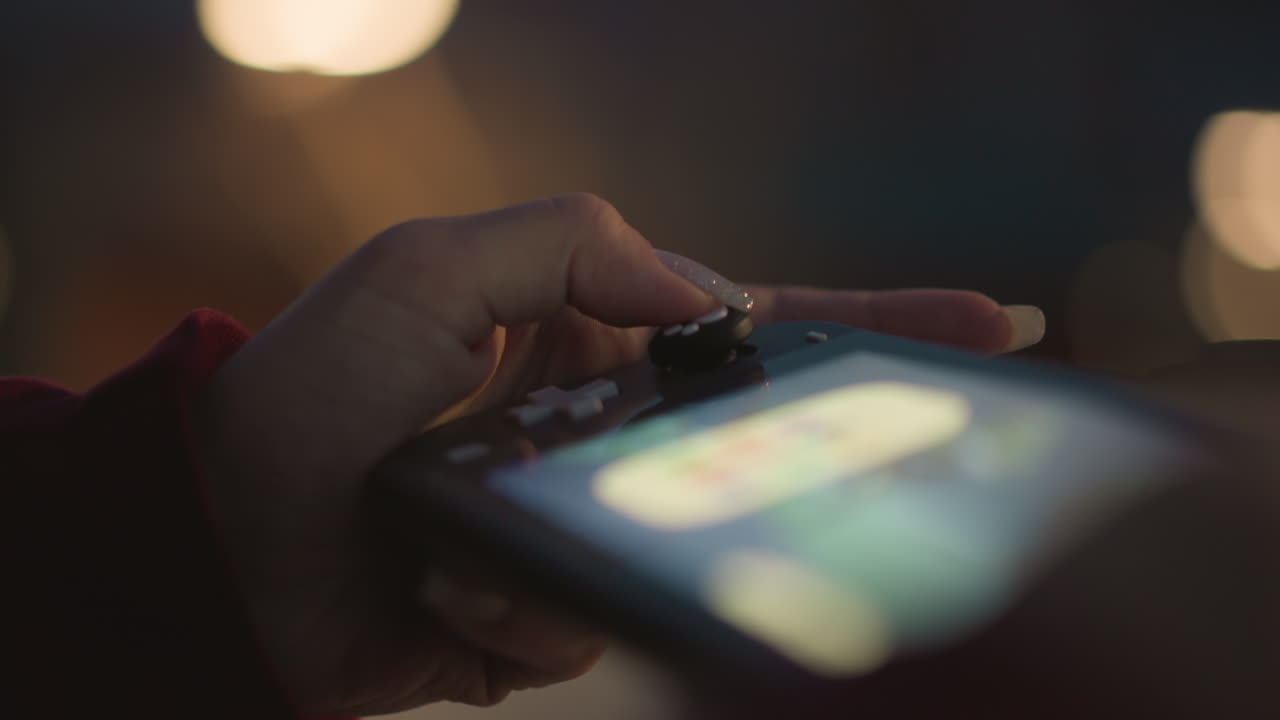 Intimate Contact Displays Refined Control In Soft Lighting Conditions, Closeup Of Fingertip Tapping Screen Showcases Mastery Over Device Amid Warm Ambient Lighting And Gentle Bokeh Effects