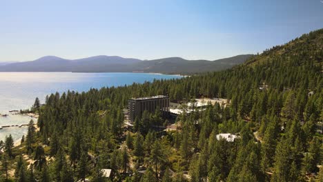 drone footage over crystal bay, nevada as the drone descends overlooking the abandoned cal neva casino