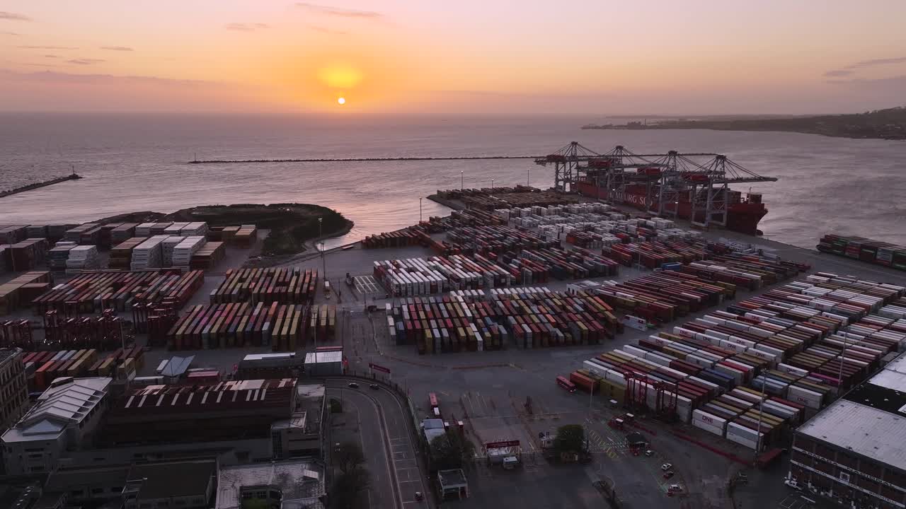 Aerial View of a Busy Port at Sunset