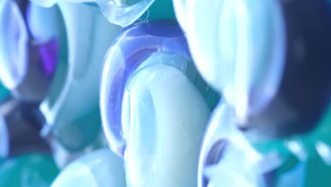 blue capsules for washing clothes in an automatic machine the concept of washing clothes