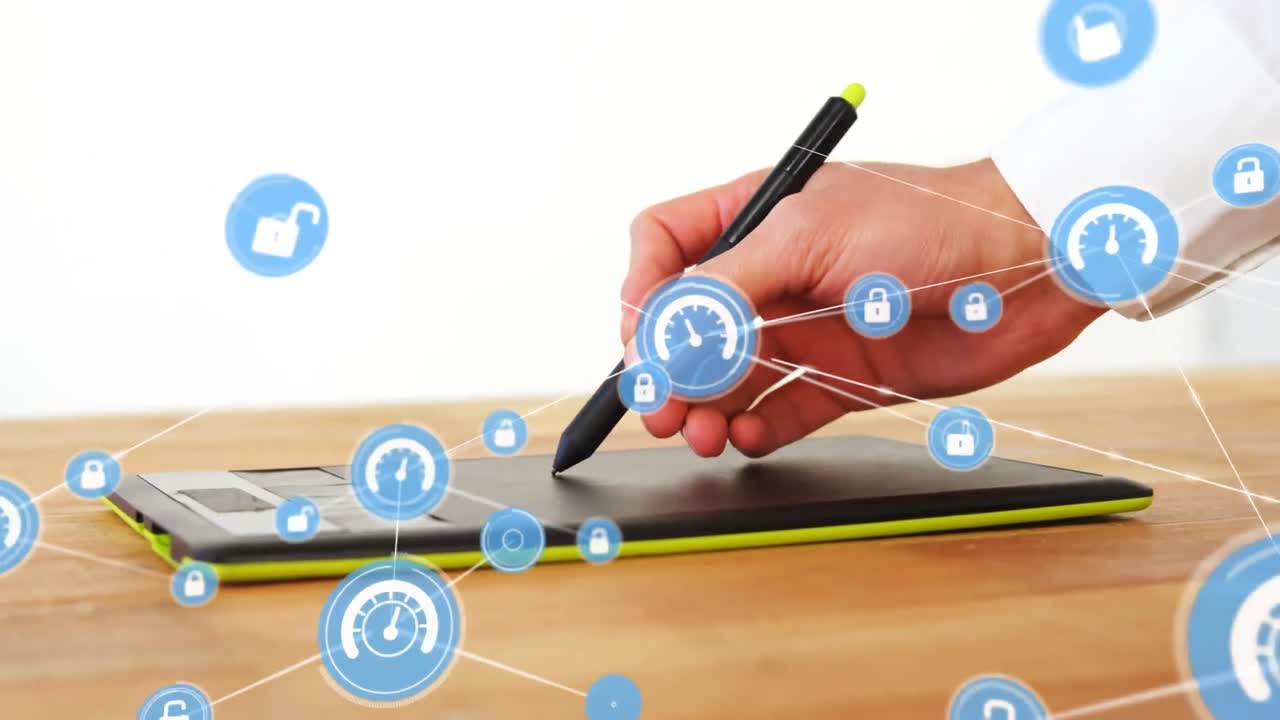 animación de iconos conectados sobre la mano recortada de un hombre caucásico dibujando en una tableta gráfica