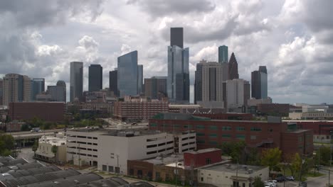 high angle 4k drone view of downtown houston at sunset
