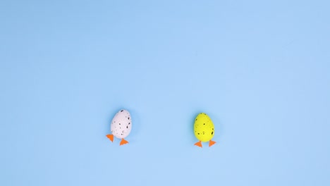 two eggs with legs appear and move and other eggs for easter appear. stop motion