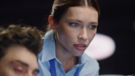 colleagues discussing it project strategy look computer screen at office closeup