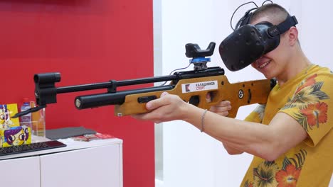 man using vr shooting simulation