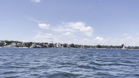 view of lamu town from a moving boat