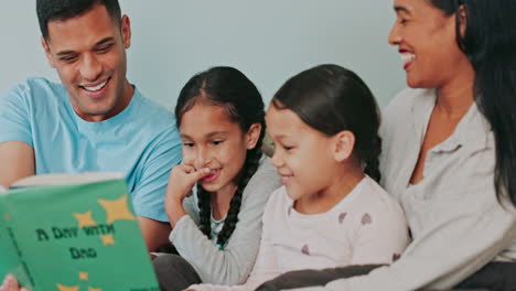 Parents,-girl-children-and-book-in-bedroom