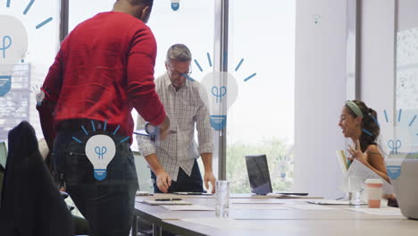 animation of lightbulb icons over diverse colleagues talking in office