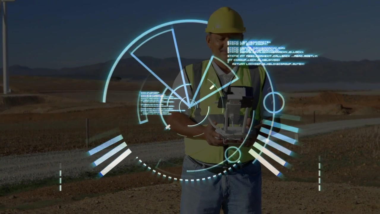Field technician using remote on gravel road in wind farm, HUD appearing and starting drone landing