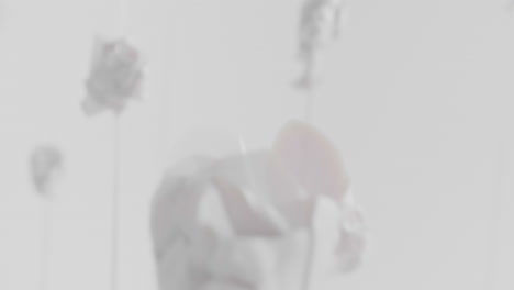 Crushed android heads on spikes in white space