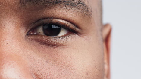 eyes, closeup and man in studio for vision