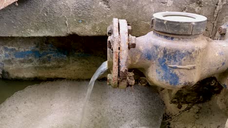 liquid waste mixed with chemicals coming out from the water meter pipe