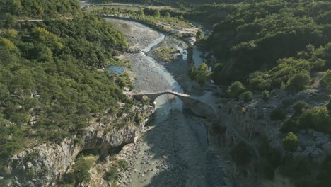 Aerial-shot-of-Benja-Thermal-Pools-and-Katiu-Bridge-in-Përmet