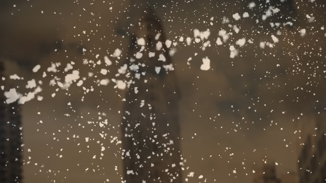 갈색 바탕에 도시 풍경 위에 떨어지는 별과 별의 애니메이션