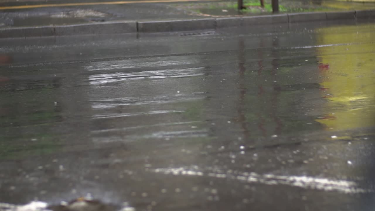 Car Tyres Driving Over Deep Pond And Splashing Water In Slow Motion