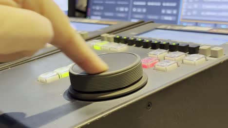 Hand Adjusting Video Mixing Console