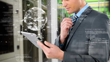 businessman studying on his tablet