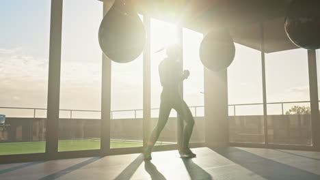 Fitness,-boxing-and-woman-training-with-a-punching