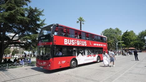 red double-decker bosphorus hop-on hop-off tour bus in istanbul