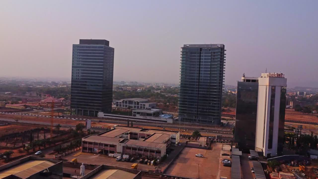 Aerial of large, distant office buildings in the business district of Abuja, Nigeria