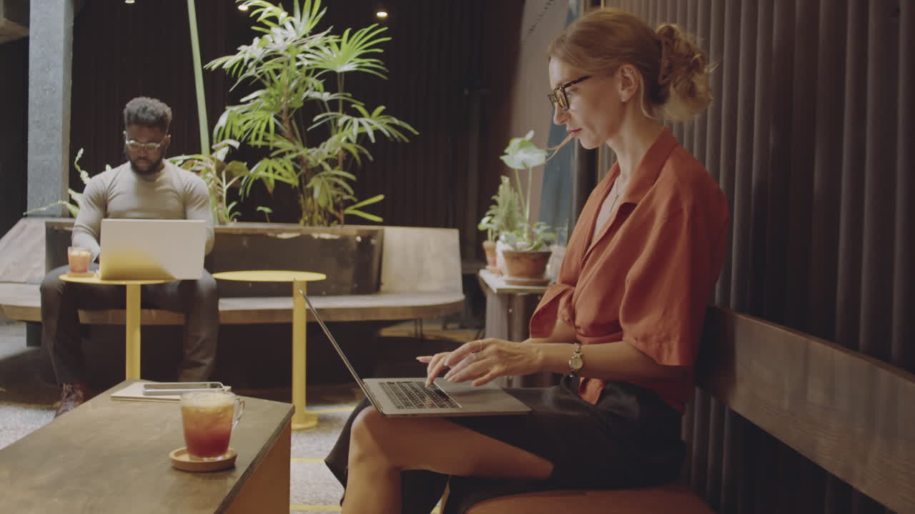 People working in a modern coworking space