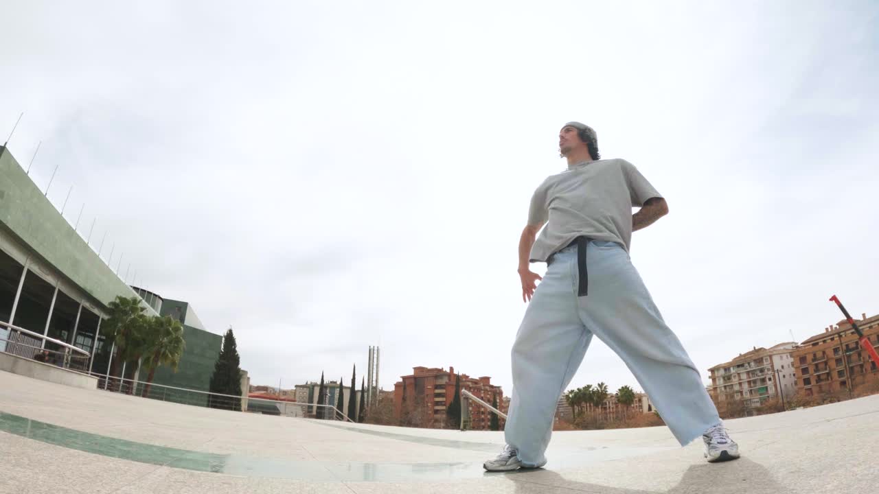 Breakdancers performing in urban environment