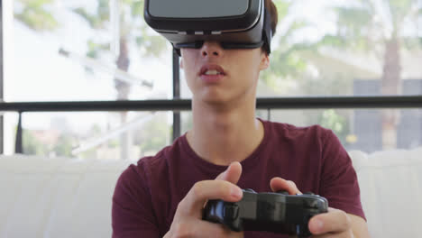 Asian-boy-wearing-vr-headset-playing-video-games-at-home