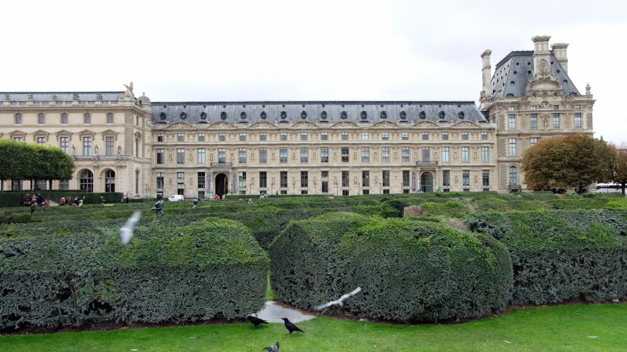 Paris, France - November 21, 2021: Front view of the Louvre Museum on a cloudy day