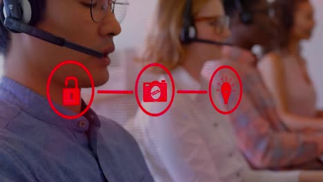 animation of set of three digital icons over business people using phone headsets