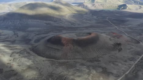 Aerial-View-Of-Crater-And-Empty-Road-At-Daytime-Near-Rangarþing-Ytra-In-Iceland