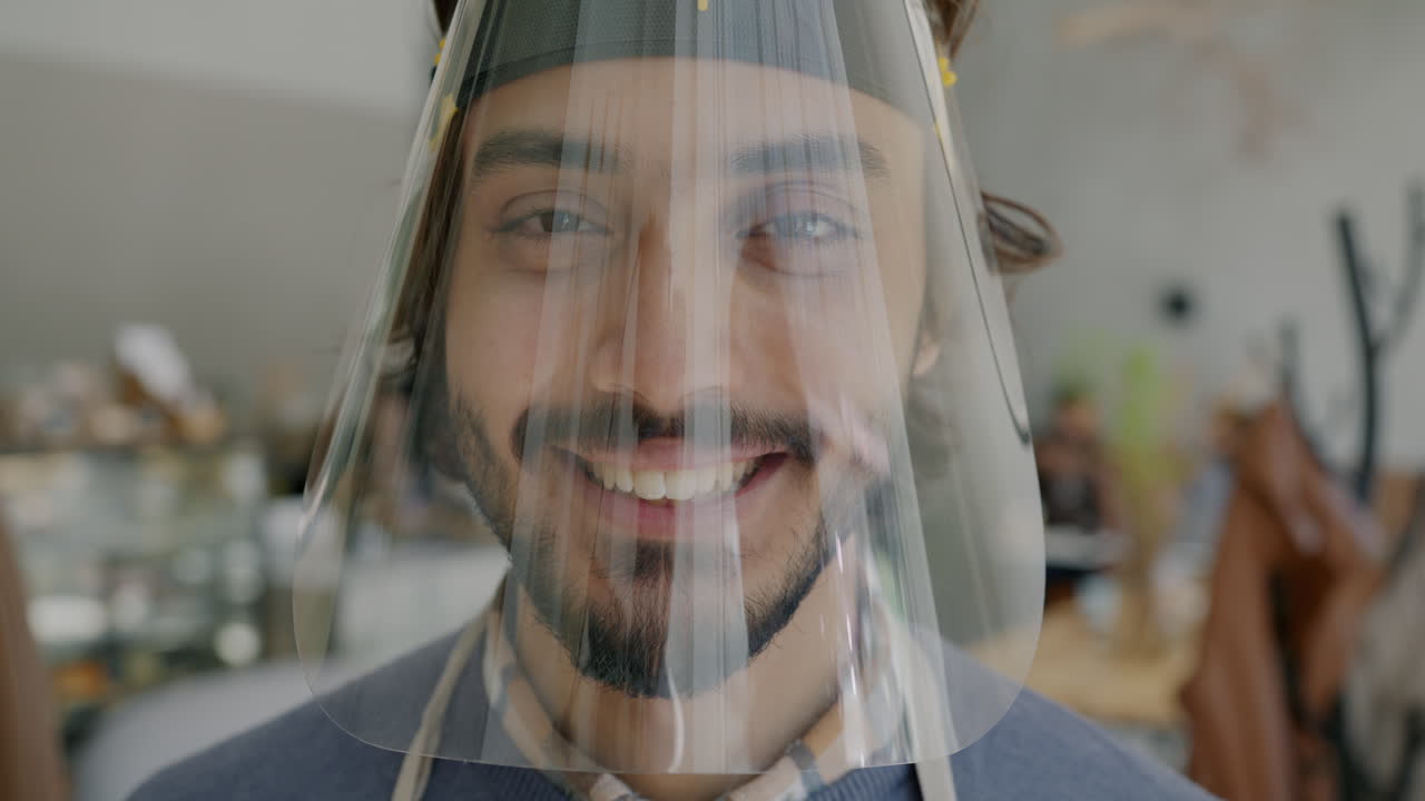 Man Wearing Face Shield in Cafe