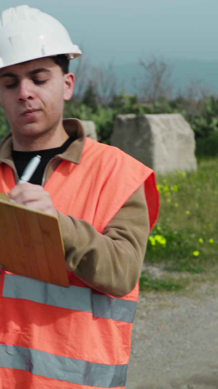 Architect Taking Notes While Walking On The Construction Site And Looking Around