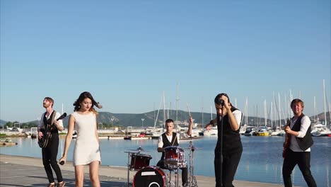 band performing at marina