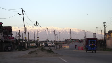 early morning in kashmir's srinagar city with a backdrop of the himalayan snowcapped mountains.