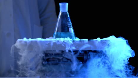 scientist performing a cryogenic experiment
