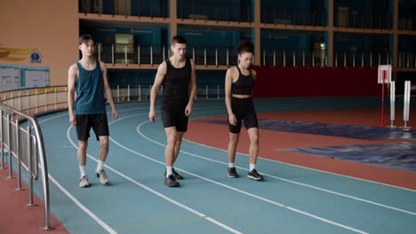 young runners on running track